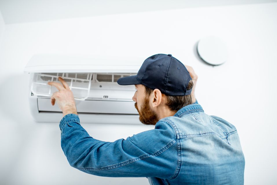 servicing an air conditioner